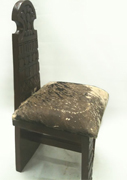 Ethiopian hand carved wooden chair with animal skin cushion